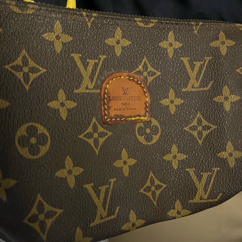 Louis Vuitton Leather Wristlet In Used Condition